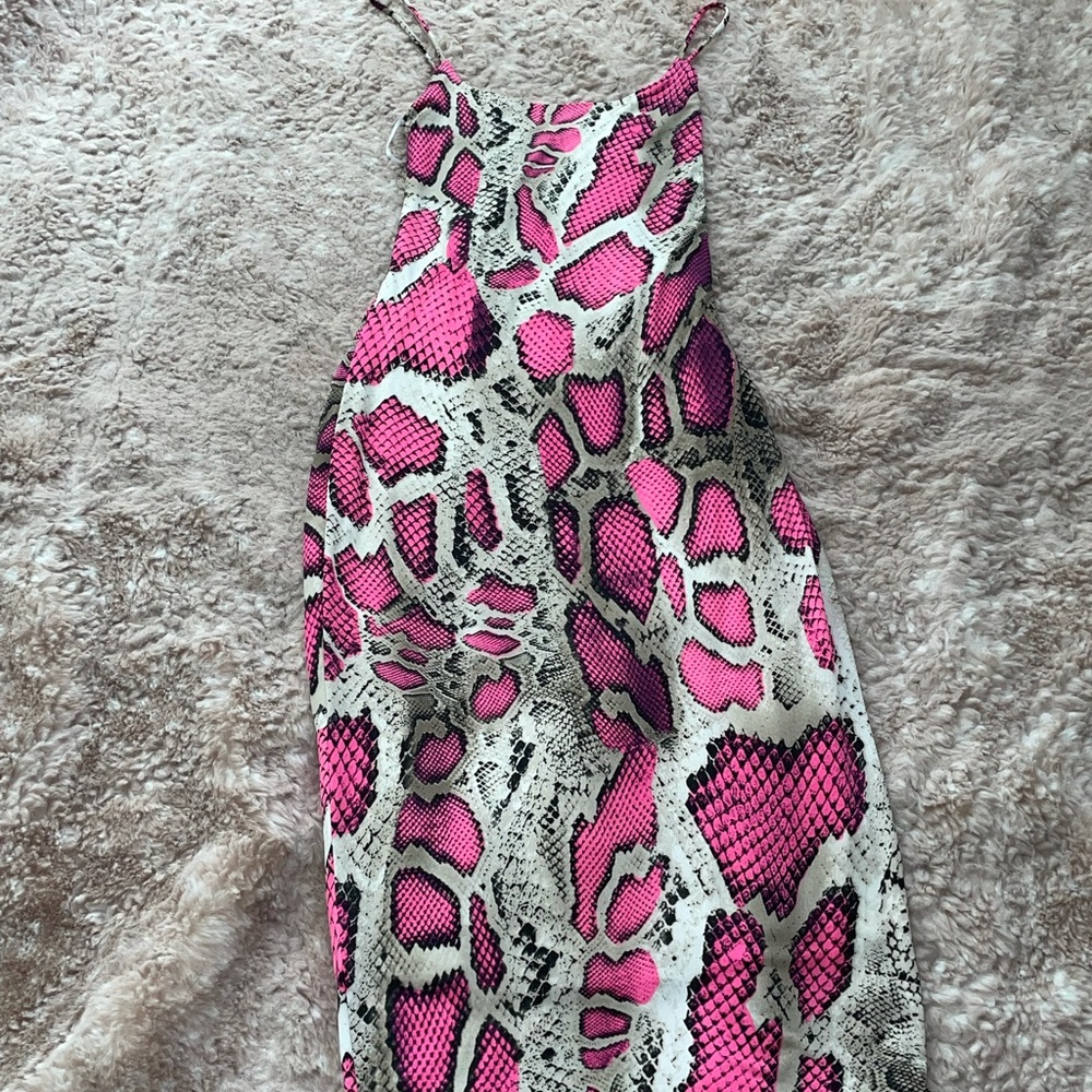 Snake print. Pink  colors. Strapping with back cross. Stretchy. Sexy.